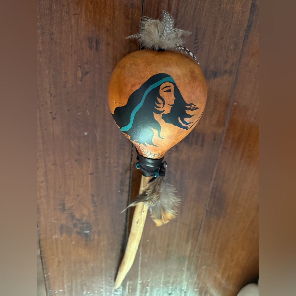 Handcrafted Gourd Rattle with Feather , leather hand painted Detail. Beautiful.